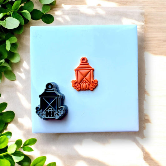 side-by-side cutter and finished fall lantern earring