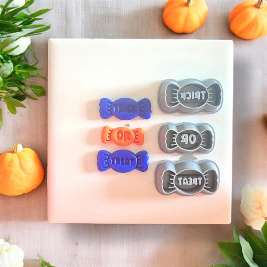Finished &quot;Trick Or Treat&quot; candies shown next to coordinating cutter set