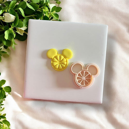 Mousey Citrus cutter next to its clay impression
