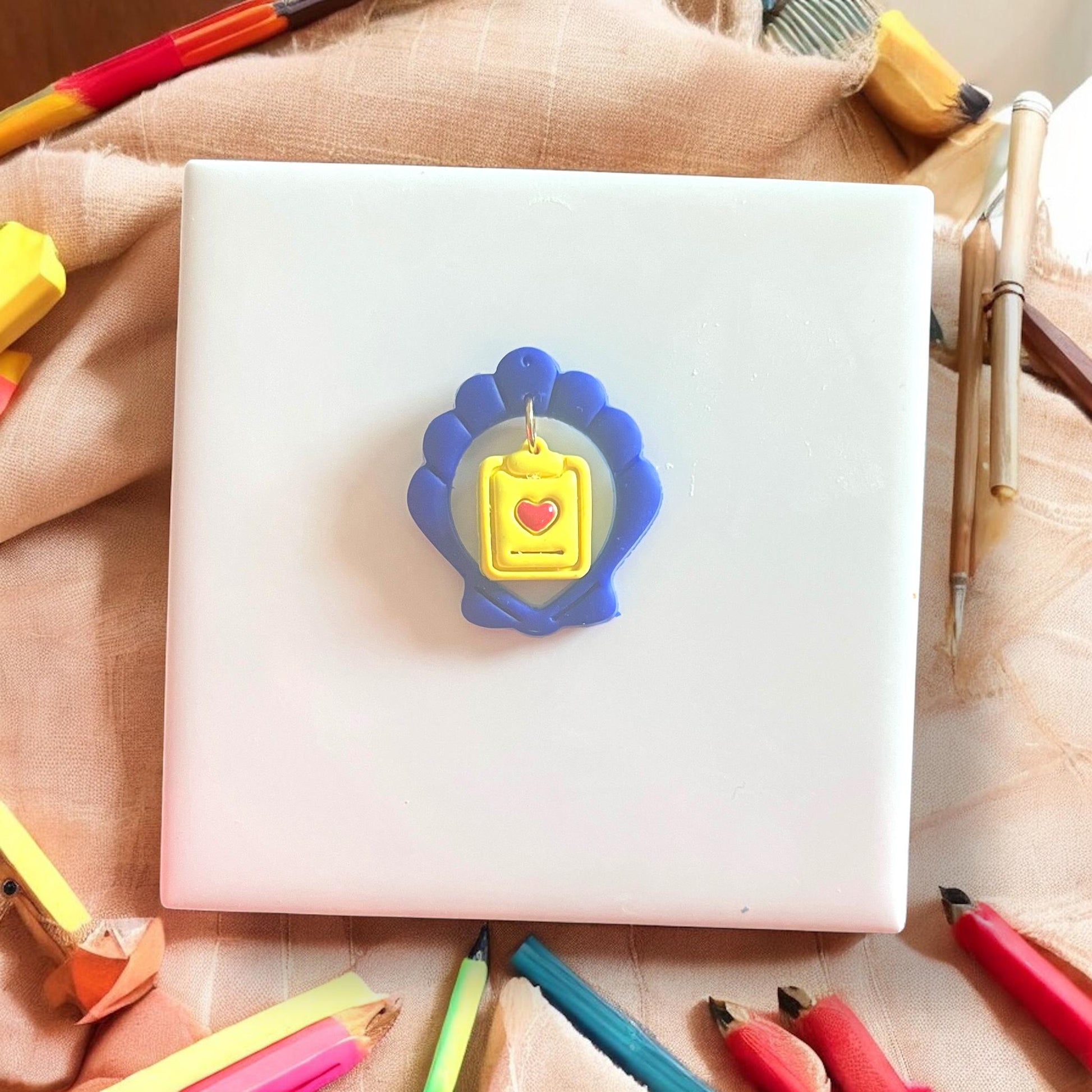 Polymer clay shell with back-to-school twist