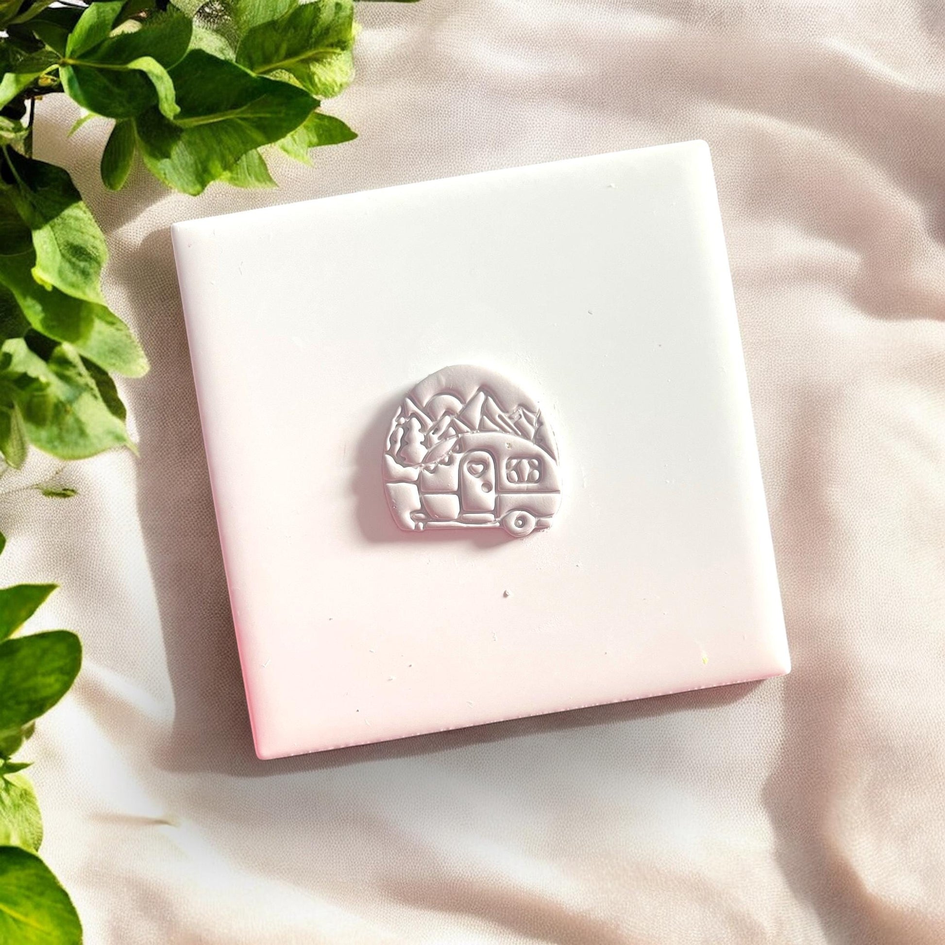 camper clay impression on white tile