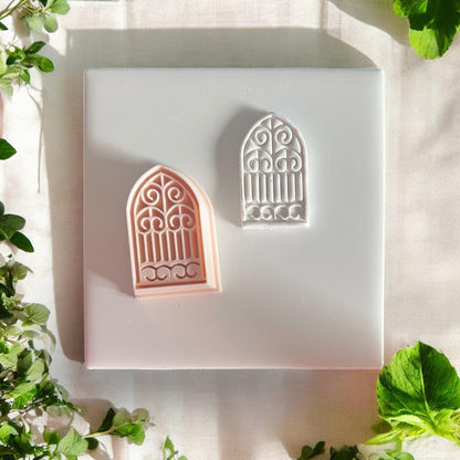 arched gate cutter with clay imprint
