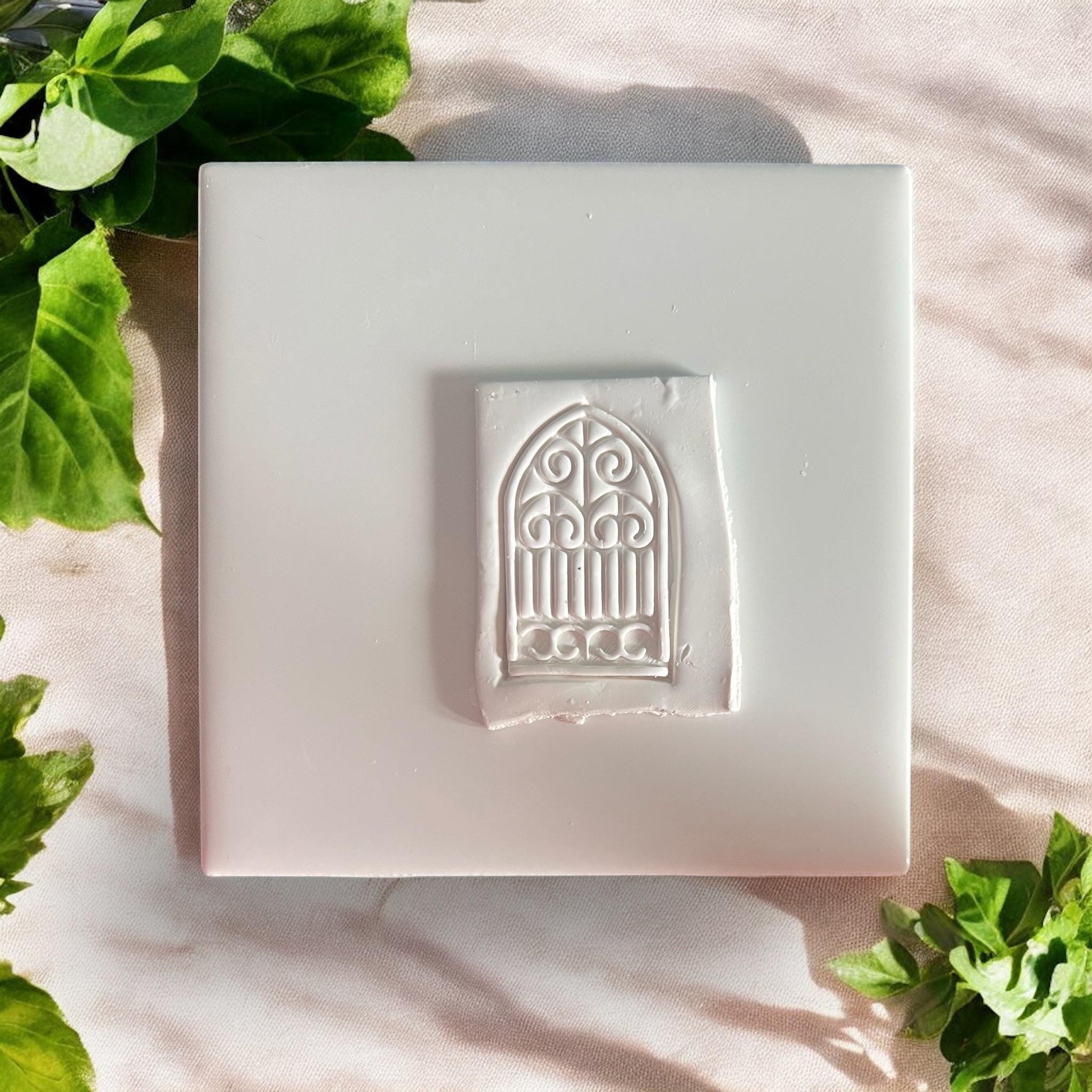 arched gate earring cutter pressed in clay