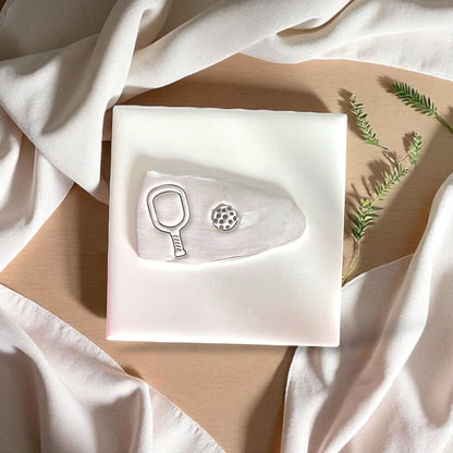 pickleball racket and ball clay cut