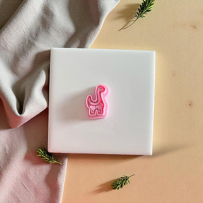 Pink Jurassic Park-style cutter shown solo on display tile