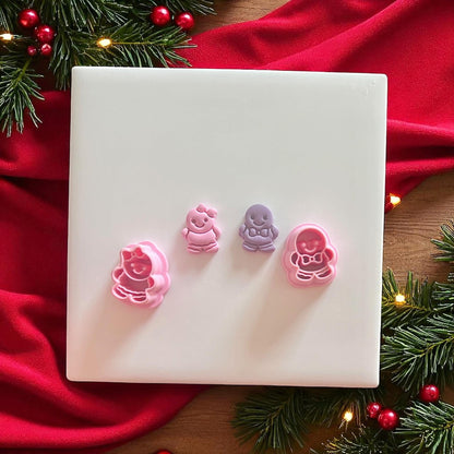 Gingerbread stud cutters next to finished pieces