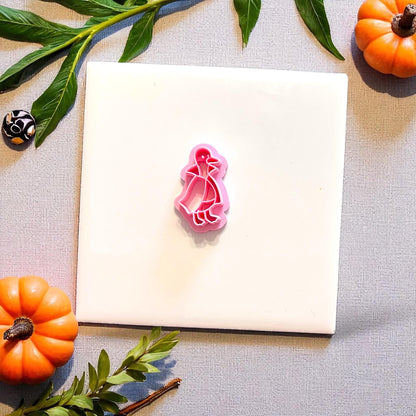 Pink Duckula cutter shown on white tile