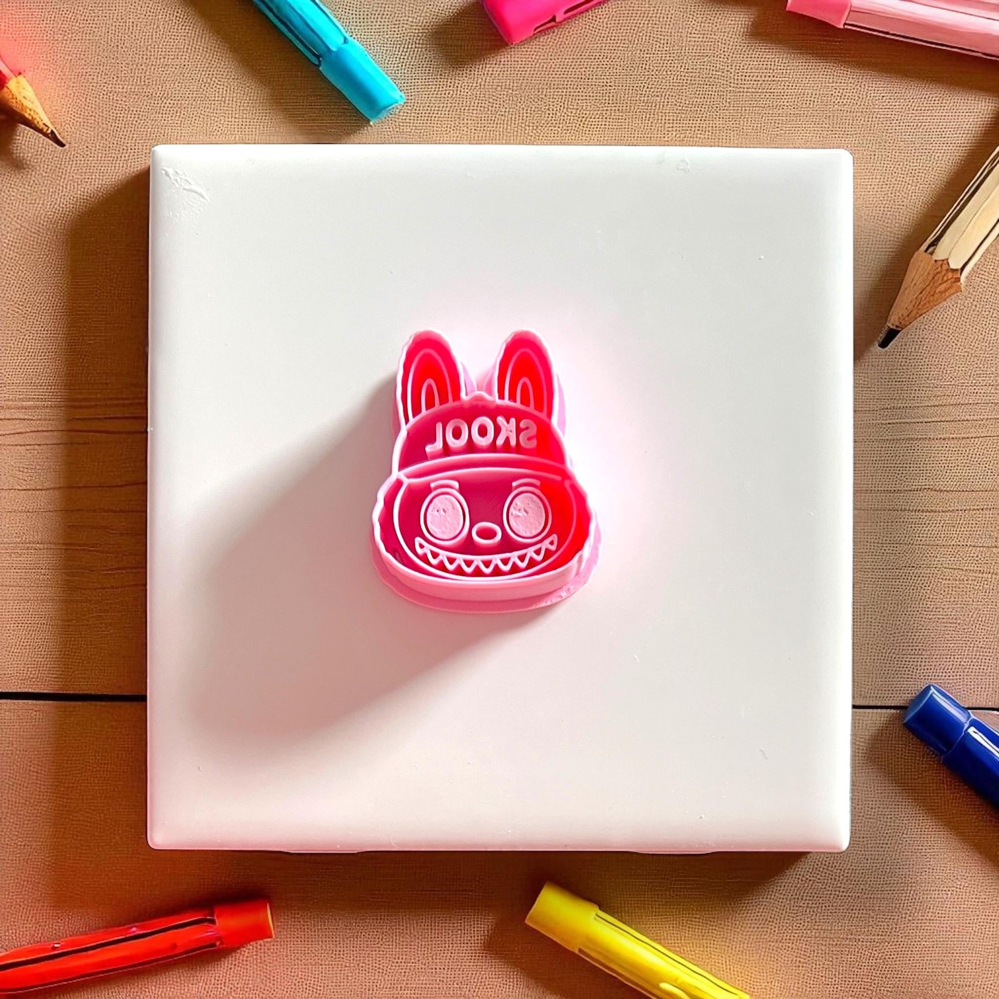 Bright red SKOOL hat monster polymer clay cutter