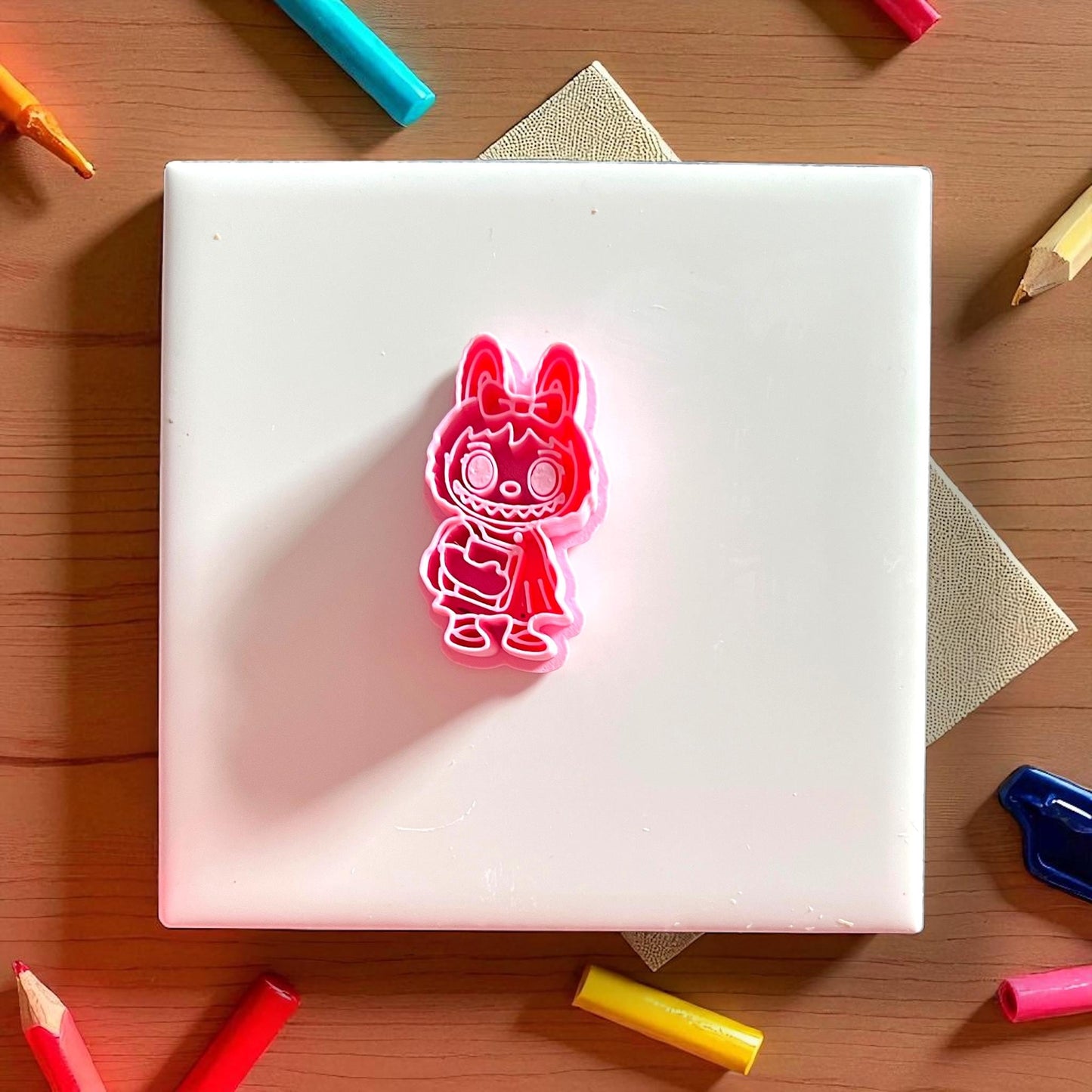 Pink monster girl earring cutter with bow