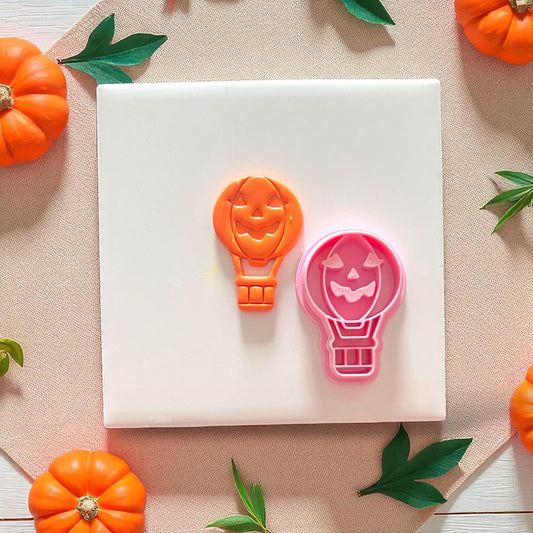 Halloween hot air balloon polymer clay cutter next to slab