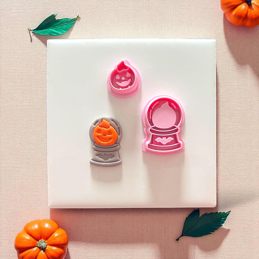 Pumpkin crystal ball with two-piece clay cutter set displayed