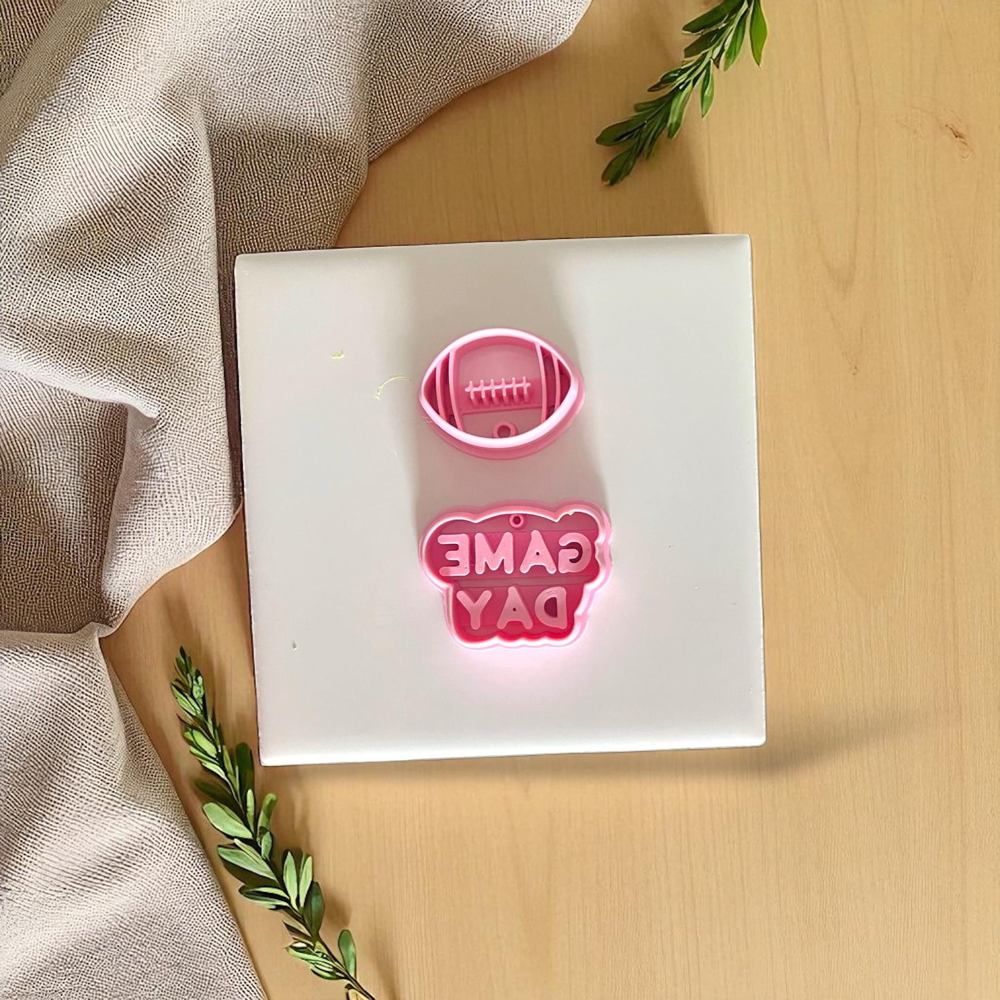 Football and Game Day polymer clay cutters in pink plastic