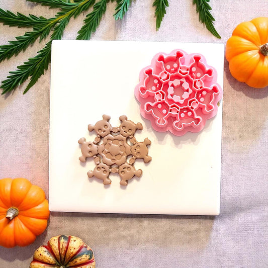 Skull wreath clay cutter and matching cutout shown together
