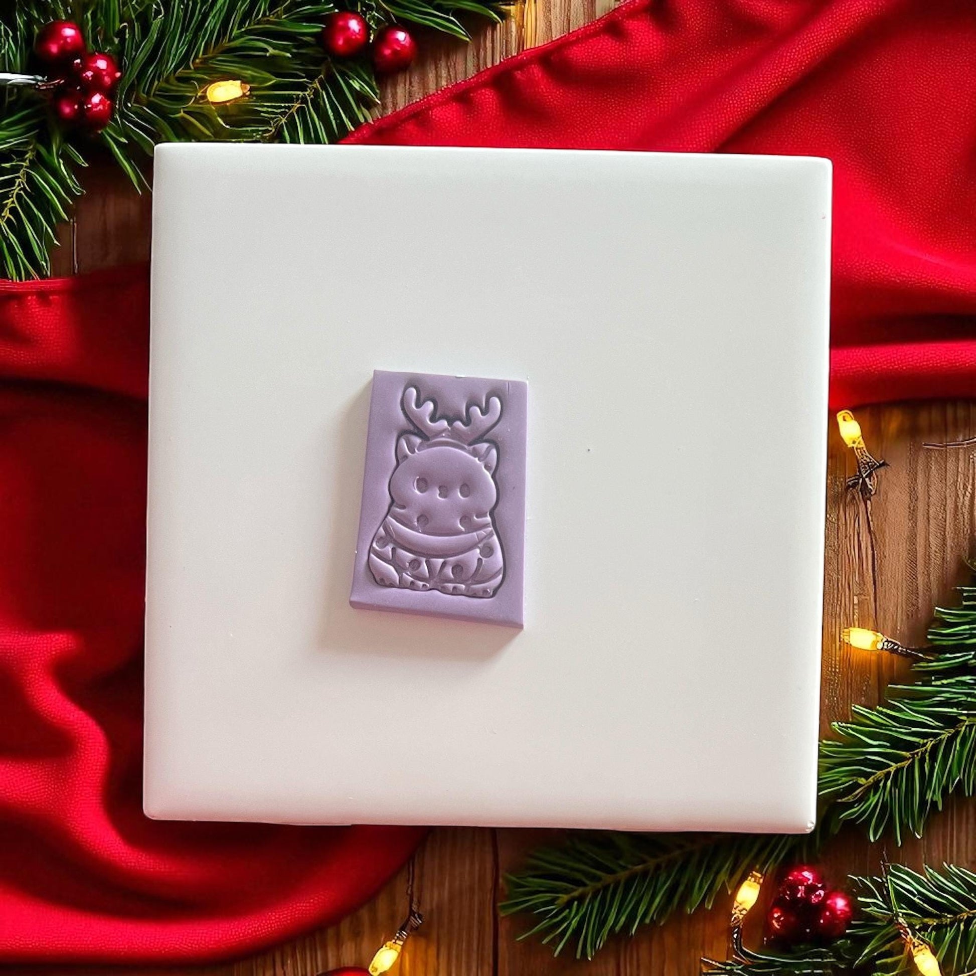 Polymer clay reindeer cat imprint with antlers and lights