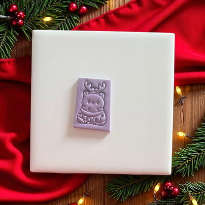 Polymer clay reindeer cat imprint with antlers and lights