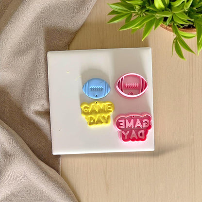 Football Game Day clay cutter set with pink and yellow clay impressions