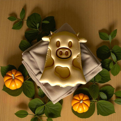 Finished golden ghost cow clay piece