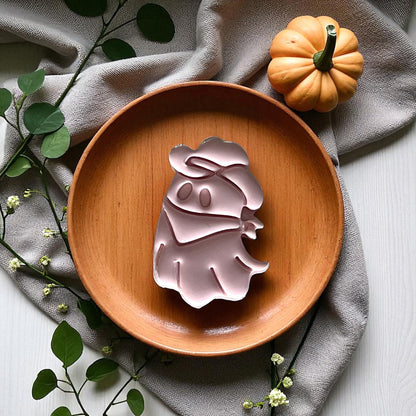 Large cowboy ghost clay piece on wooden plate