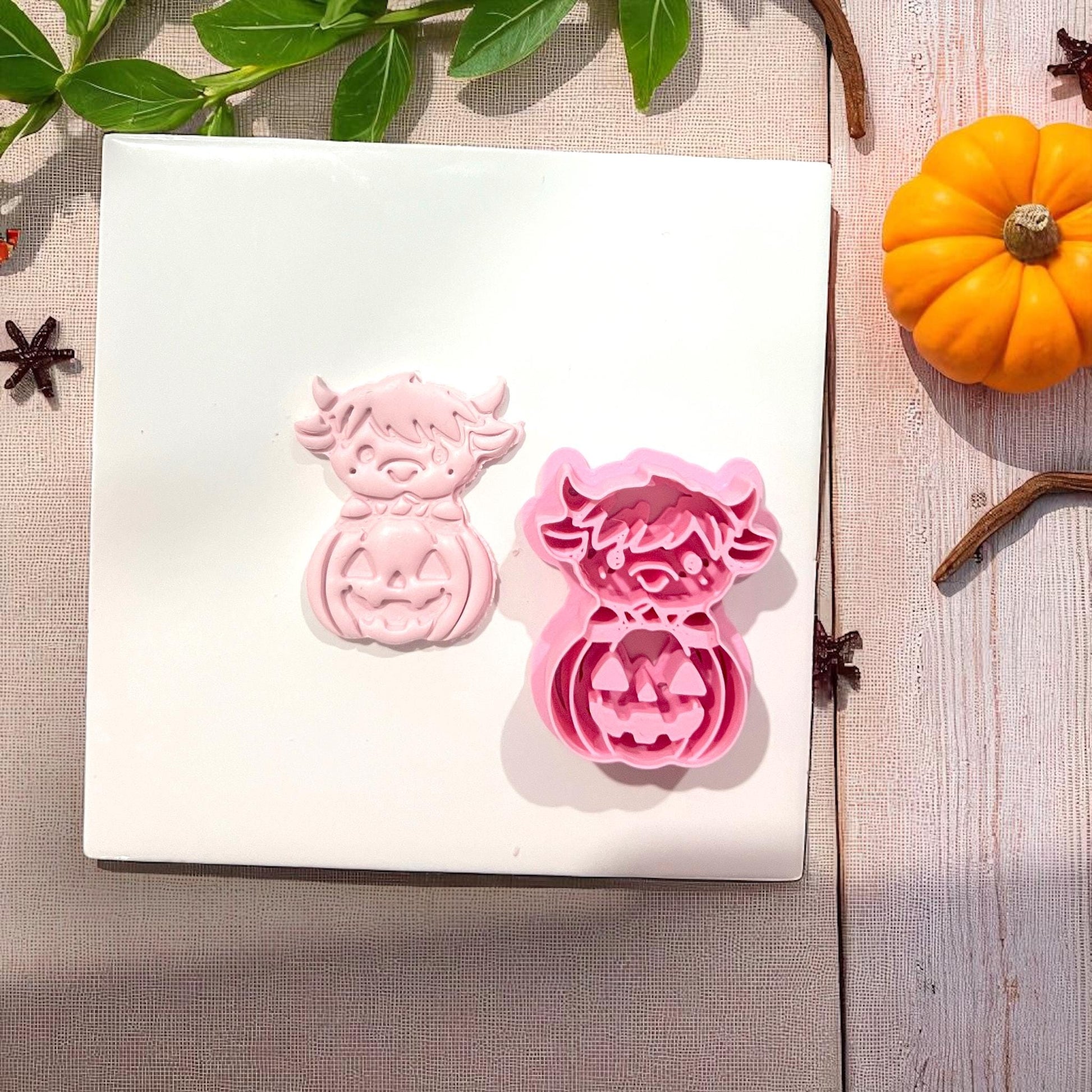 Cutter and clay impression of highland cow pumpkin