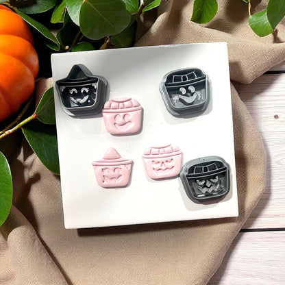 Pumpkin bucket cutters and clay impressions displayed together