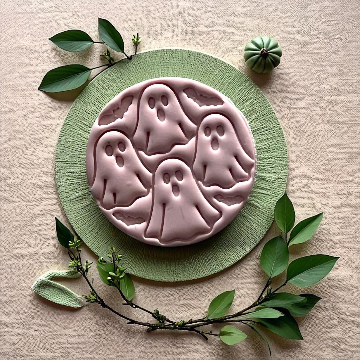 Large clay ghost circle design with bats on green textured plate