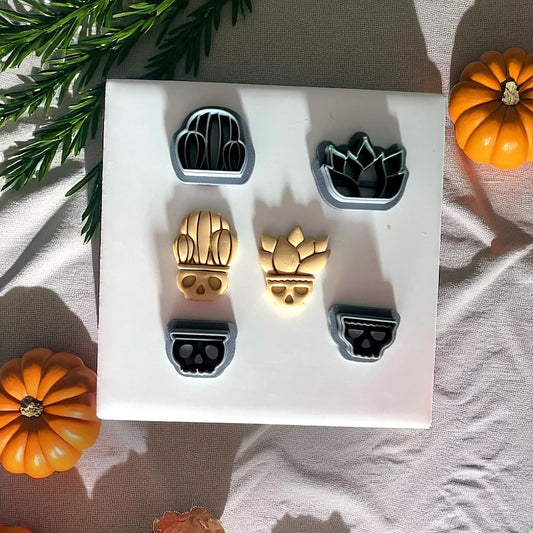 Skull pot cactus and succulent clay cutters with yellow clay designs