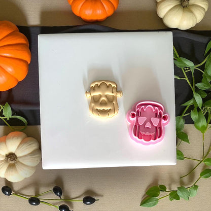 Frankenstein pumpkin clay imprint and pink cutter side by side