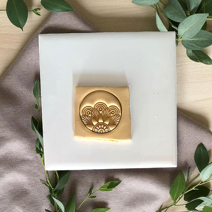 Round Art Deco polymer clay cutter on white tile