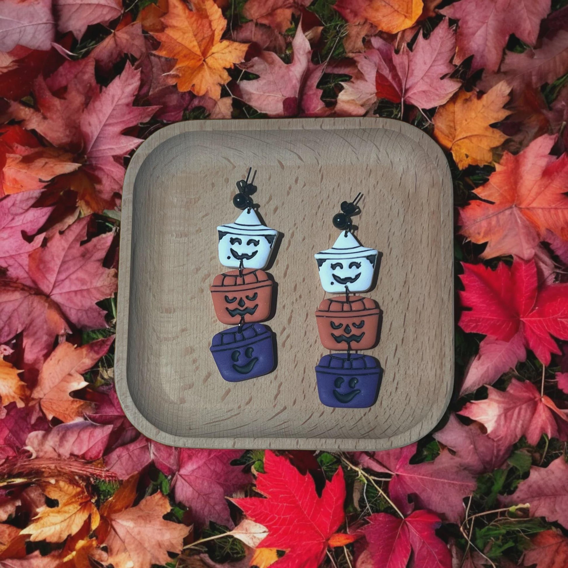 Colorful Halloween earrings made with stacked pumpkin bucket cutters