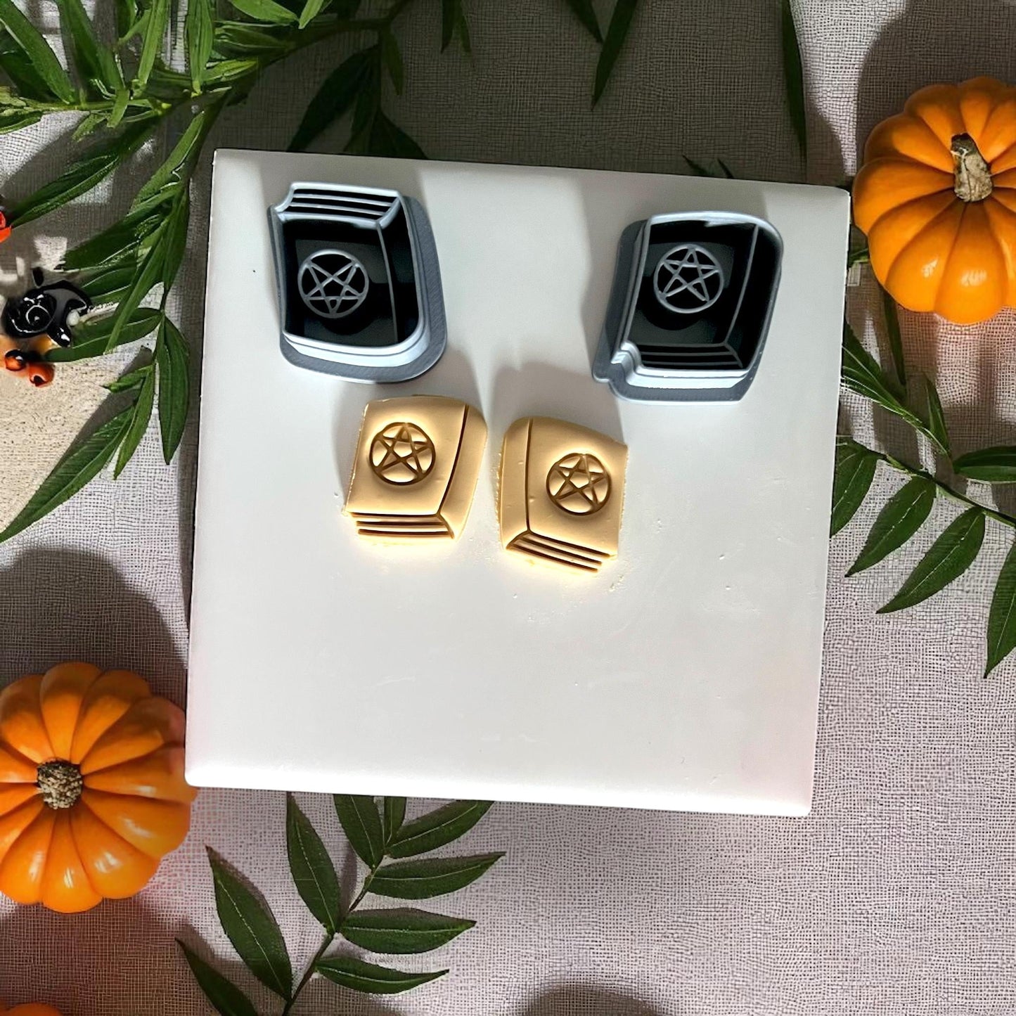 Witch book clay cutters with yellow clay spellbooks