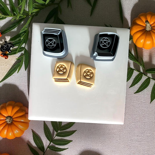 Witch book clay cutters with yellow clay spellbooks