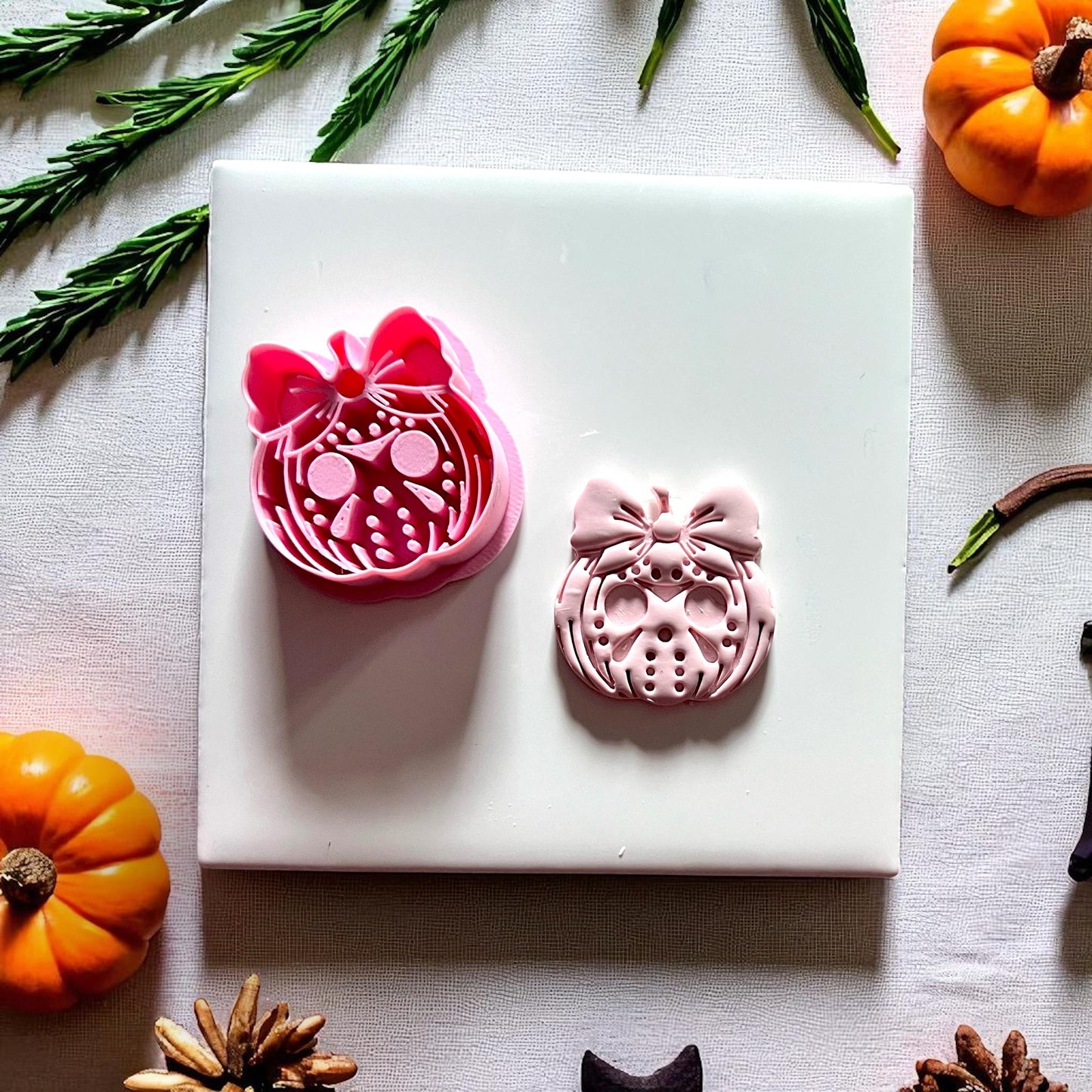 Jason pumpkin with bow clay cutter and clay imprint side by side