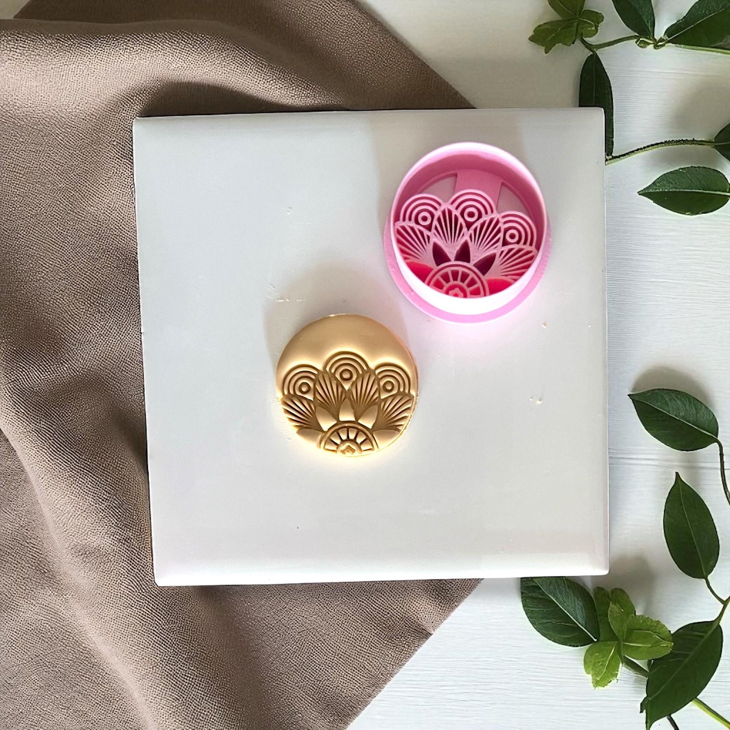 Round polymer clay cutter with matching clay imprint