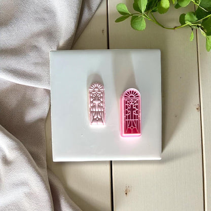 Two stained glass cross polymer clay cutters with imprint