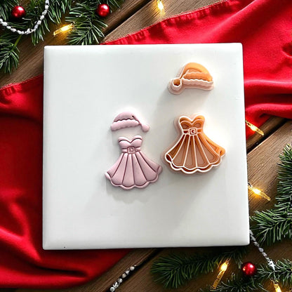 Pink clay imprint of Mrs Santa dress and hat with holiday lights