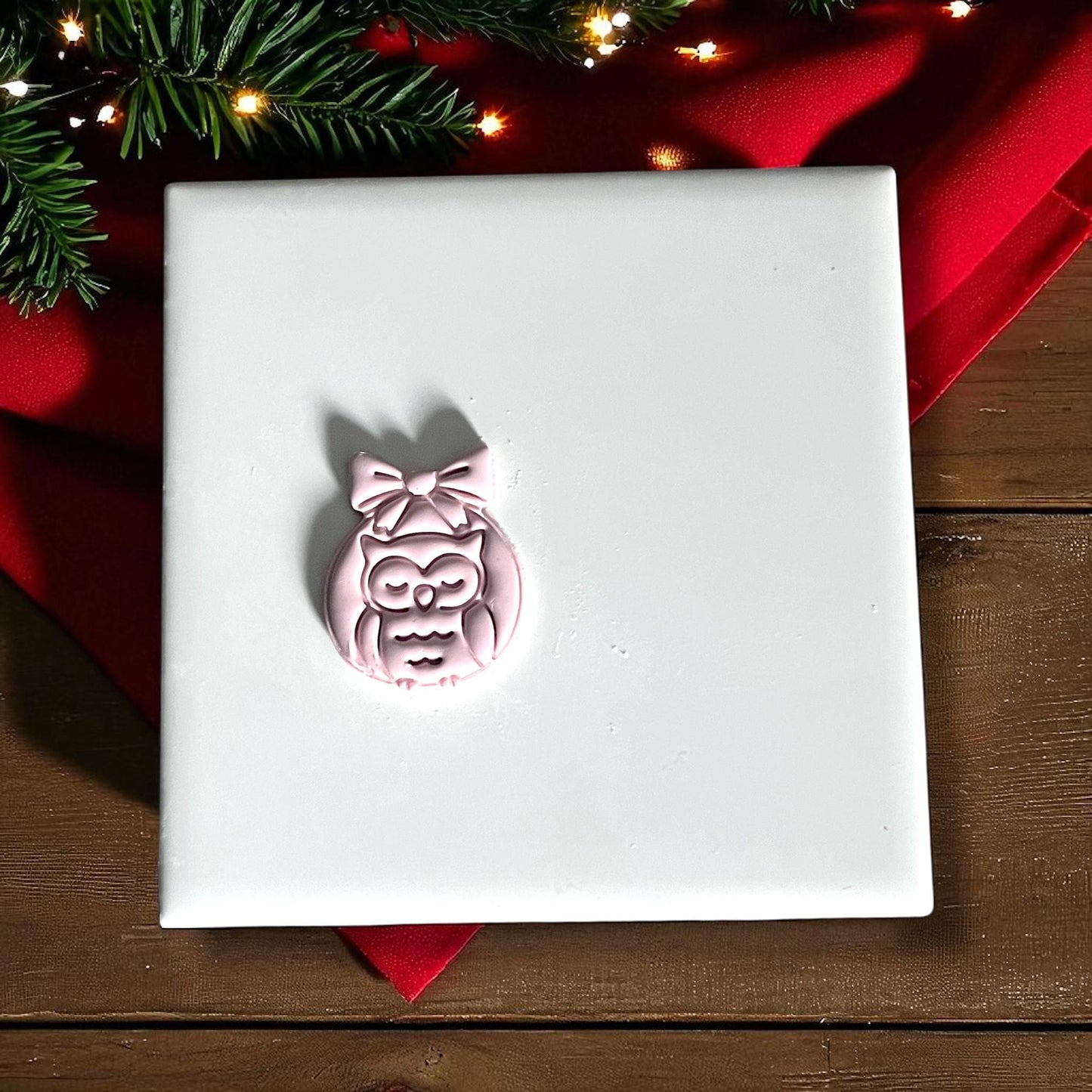 Owl ornament clay imprint with bow and holiday greenery