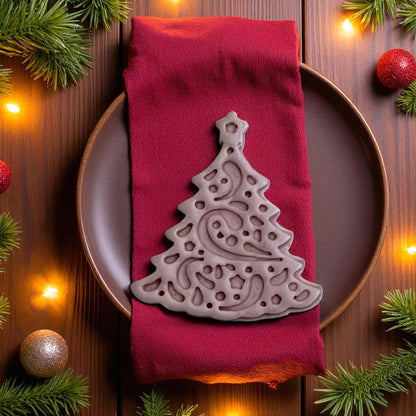 Large brown Christmas tree clay imprint on red cloth with Christmas lights