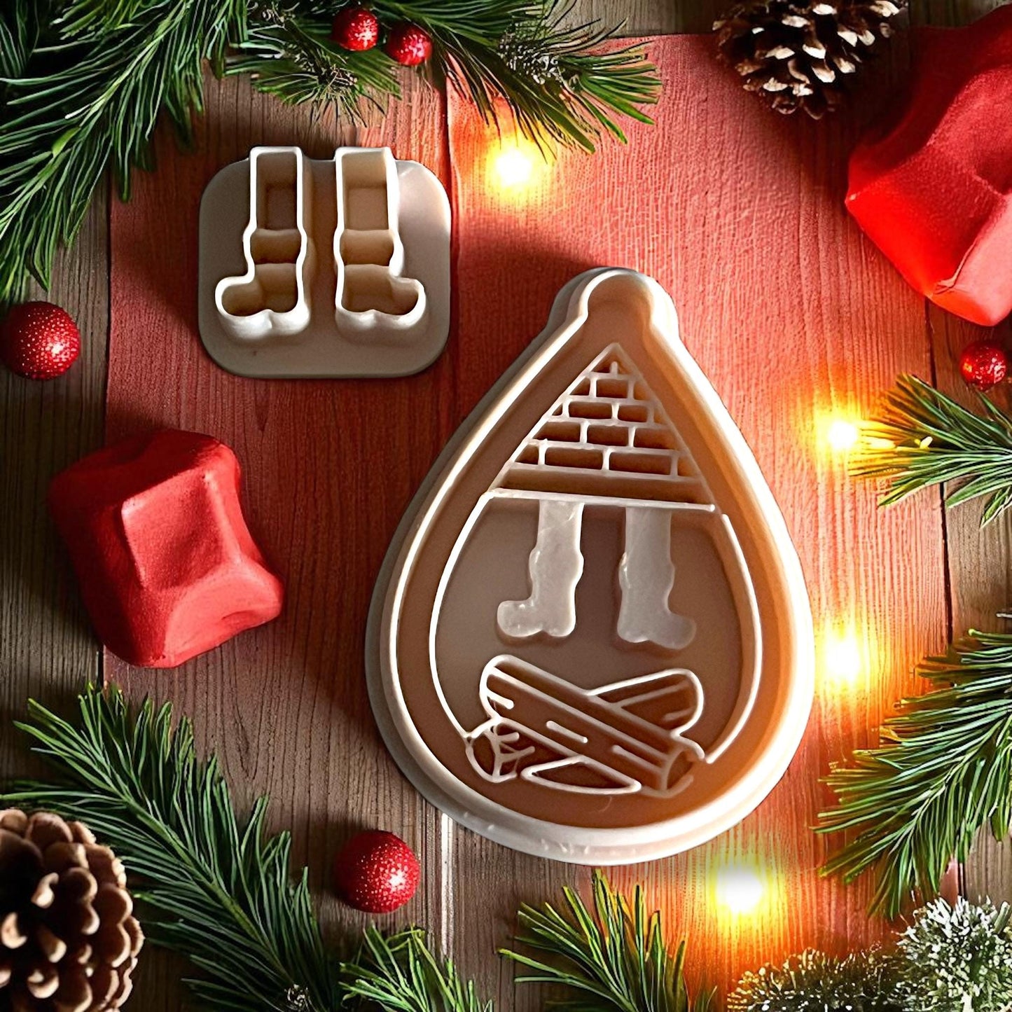 Polymer clay chimney and boots imprint displayed on white tile with holiday background