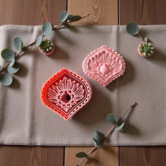 Diamond Art Deco floral cutter and pink clay imprint on linen with succulents and eucalyptus
