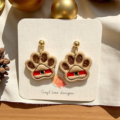 Santa paw polymer clay earrings with gold studs and festive decor
