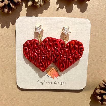 Red clay earrings with Merry Christmas heart design and gold star studs