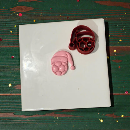 soccer santa hat cutter with pink clay impression