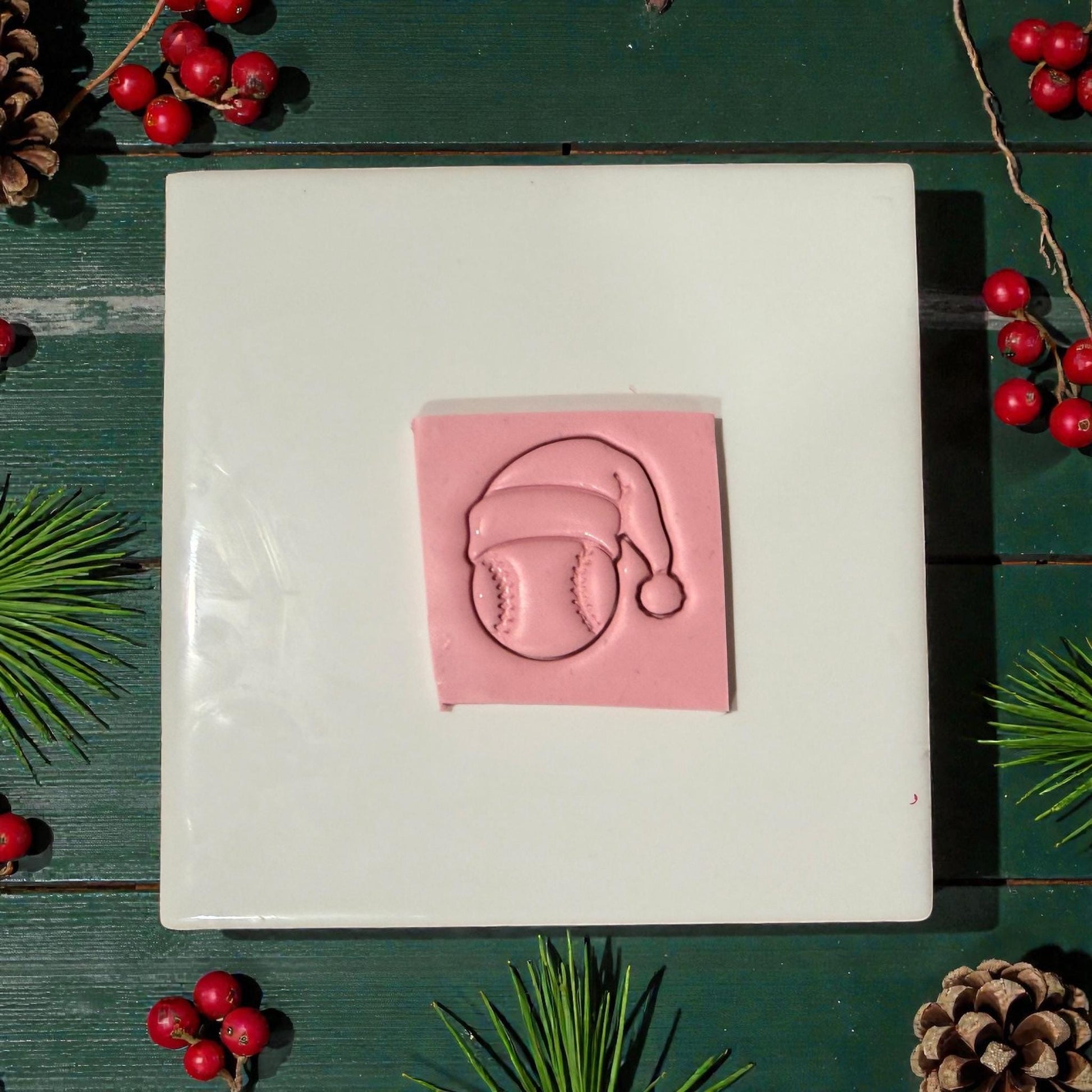 baseball santa clay impression on tile with greenery