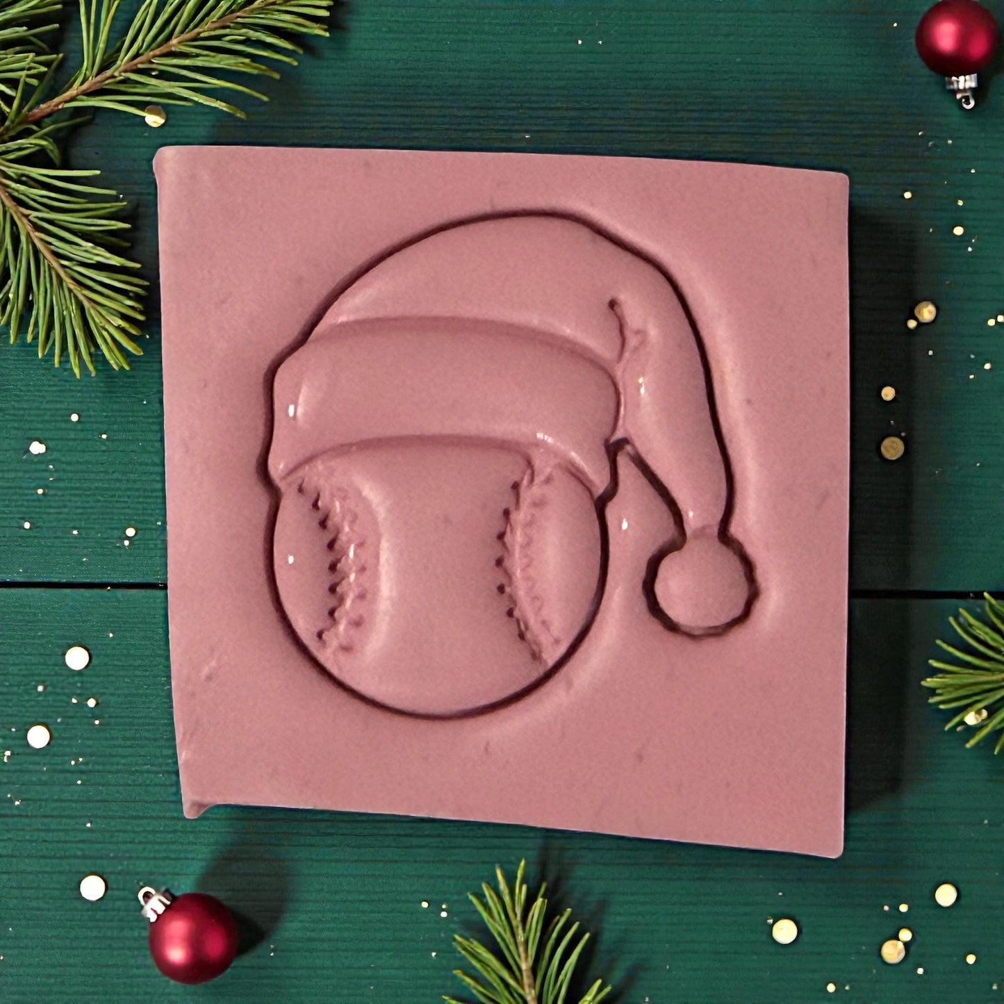 closeup baseball santa clay impression on green background