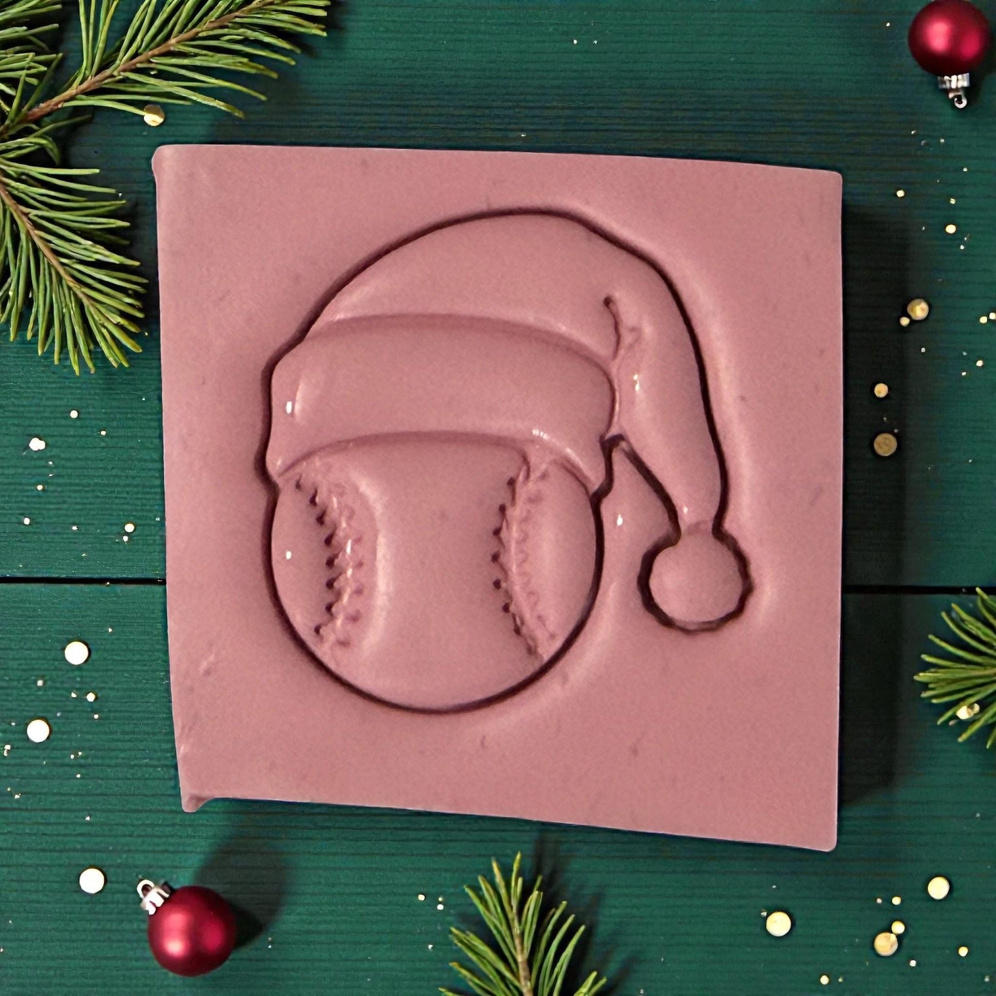 closeup baseball santa clay impression on green background