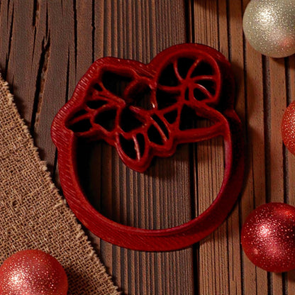 red coconut peppermint flower clay cutter on wood background