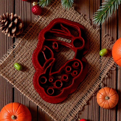 Red flamingo Christmas cutter on burlap with mini citrus decor
