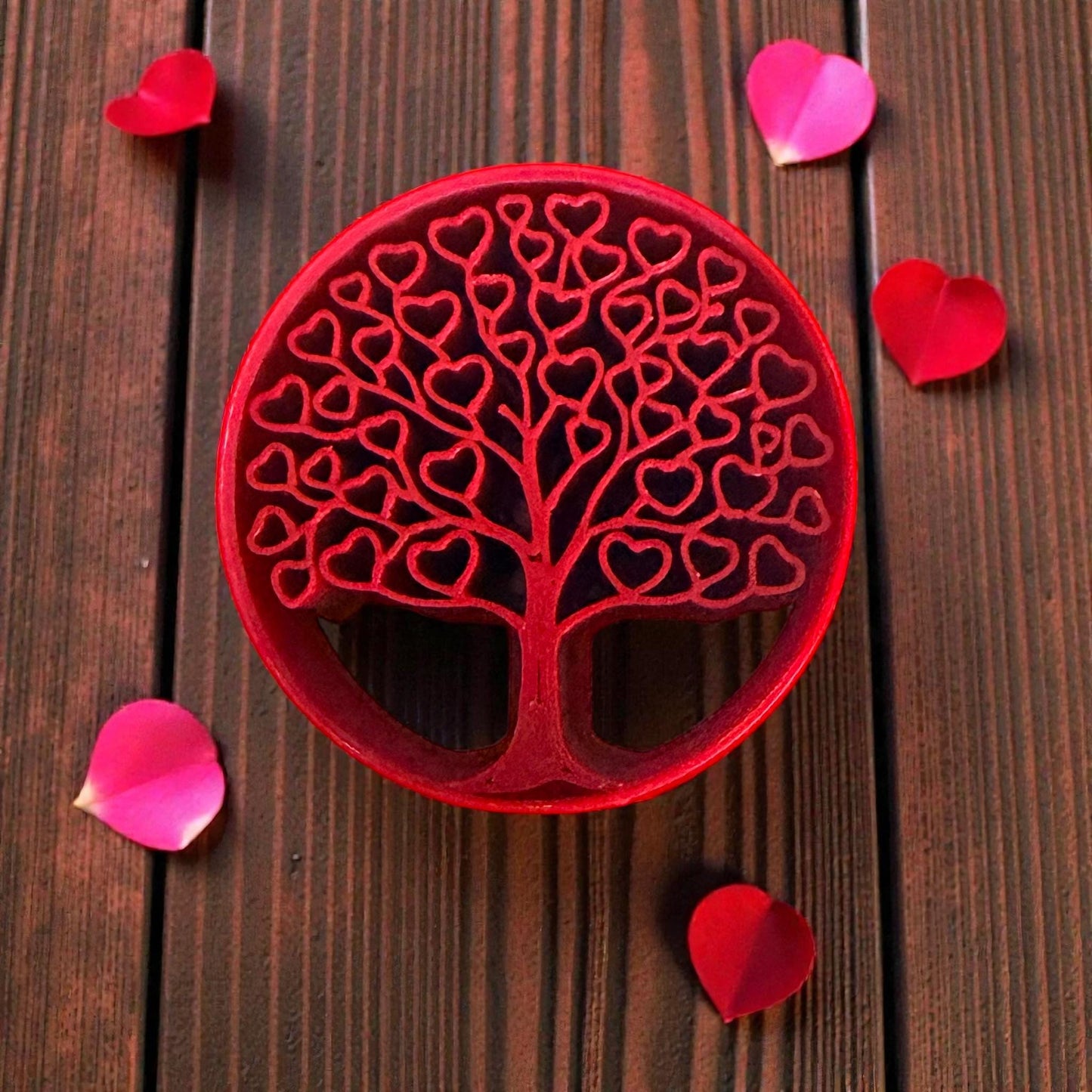 heart tree clay cutter surrounded by rose petals