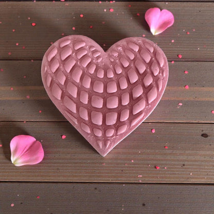 red and pink heart web clay pieces arranged with petals