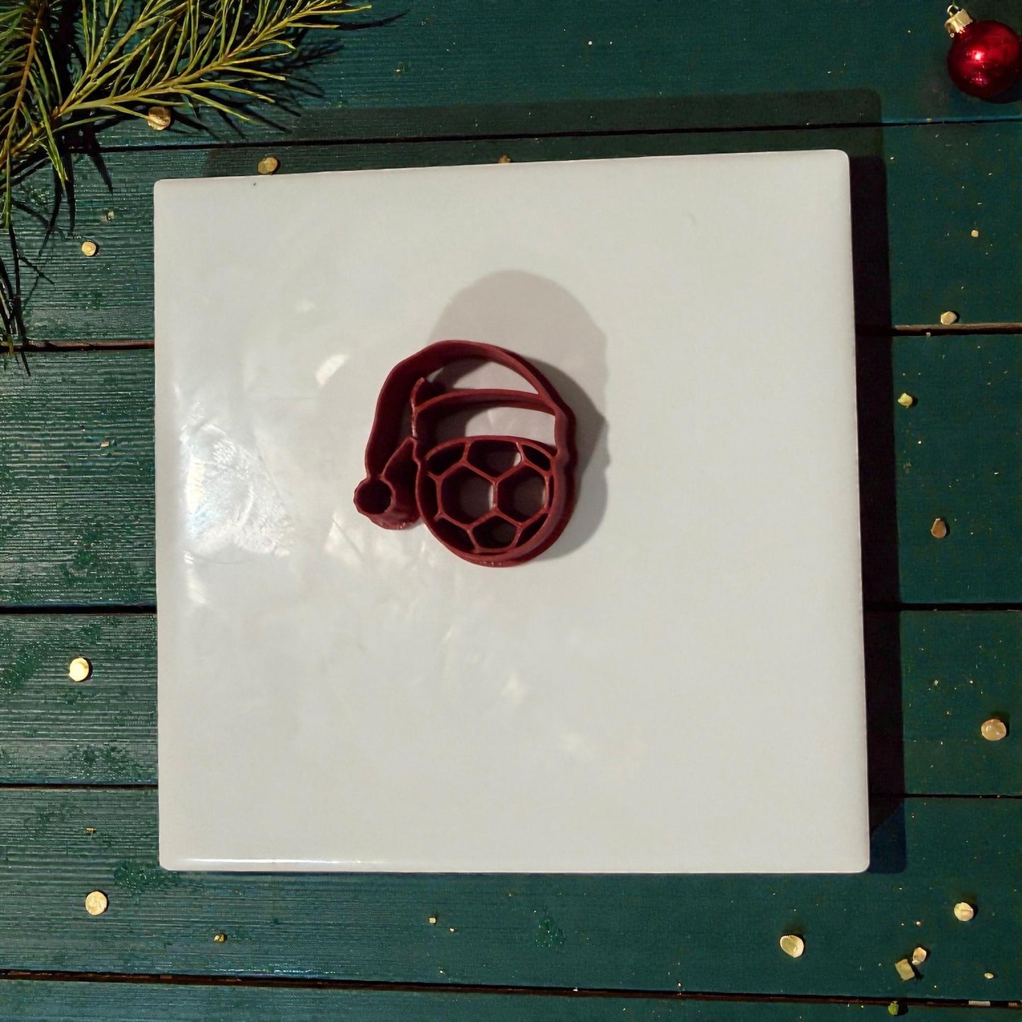 soccer santa hat cutter centered on white tile